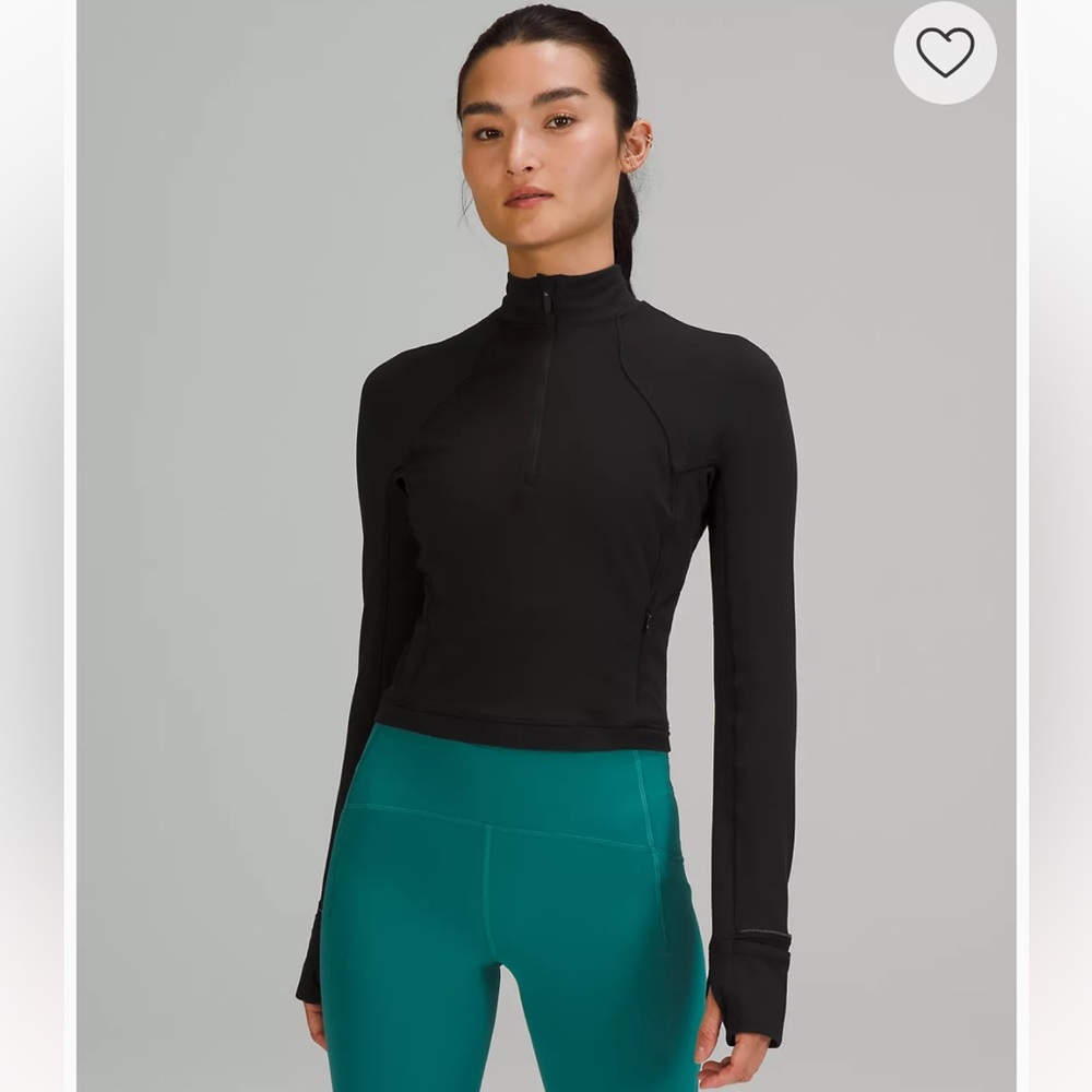 Lululemon cropped quarter zip. It's lightweight and  a color similar to magenta